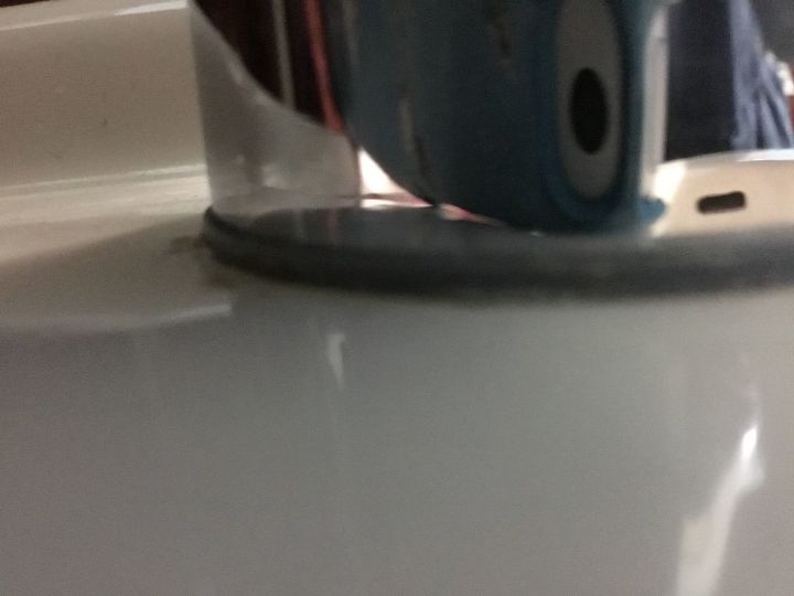 how do you get rid of hard water stains around faucets