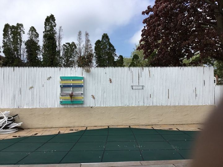 q what can i do with this fence need decor ideas or any solutions