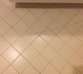 Bathroom. Tile. A crack across the floor. Hometalk