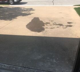 q how do you get oil stain off your driveway