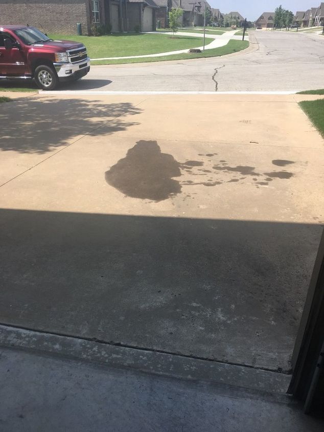 q how do you get oil stain off your driveway