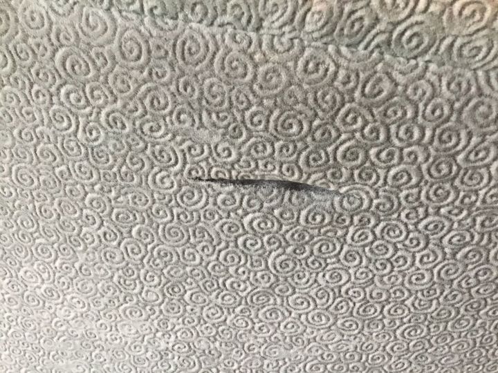 q how do i repair this rip on the side of this chair