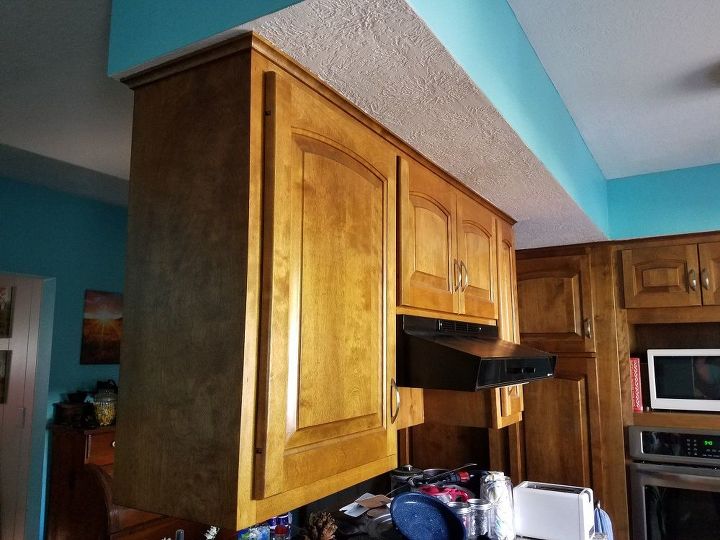 q i want to remove upper cabinets to open my kitchen what do i do