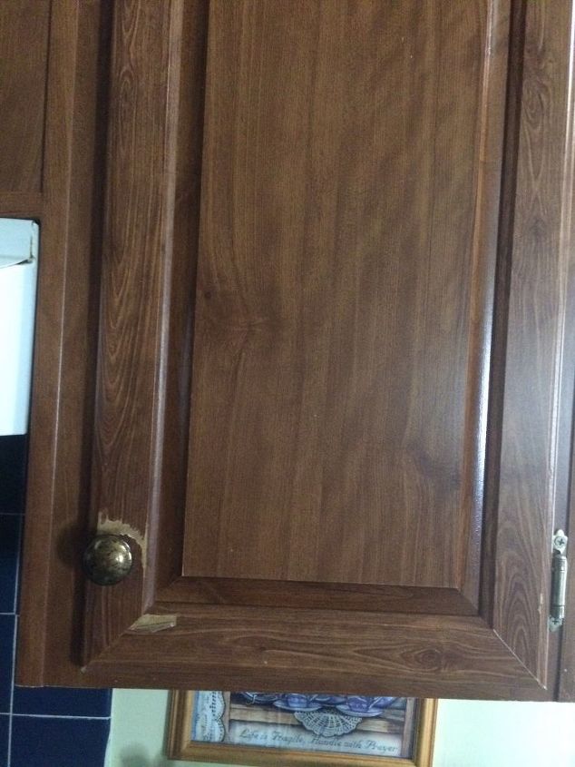 20 Year Old Kitchen Cabinets Made Of Pressed Wood And Covered In