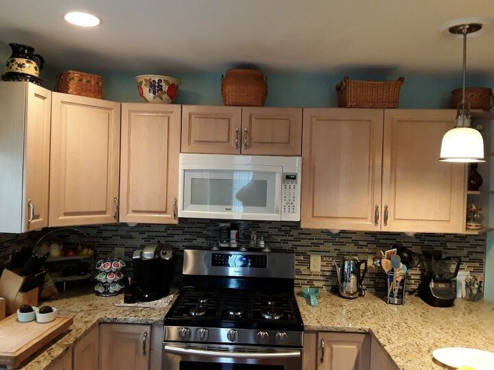 q i want to add crown molding to the top of my cabinets