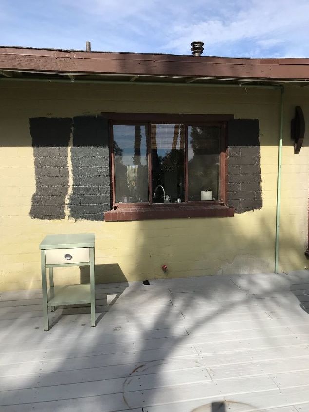 modern ranch black house wood trim