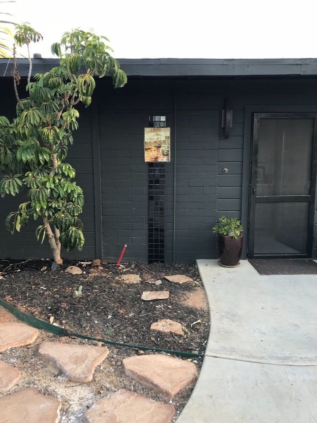 modern ranch black house wood trim