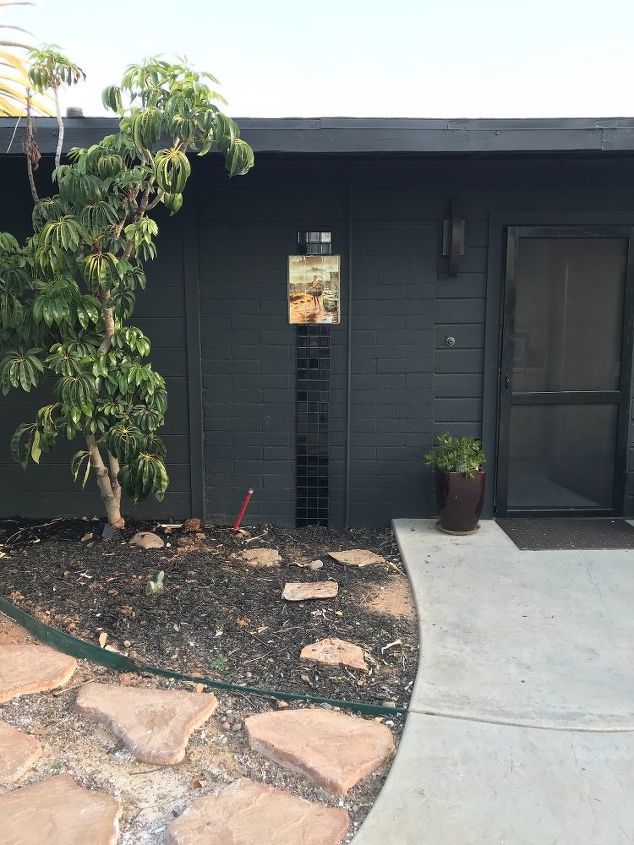 modern ranch black house wood trim