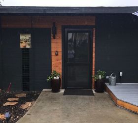 modern ranch black house wood trim