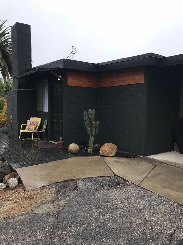 modern ranch black house wood trim