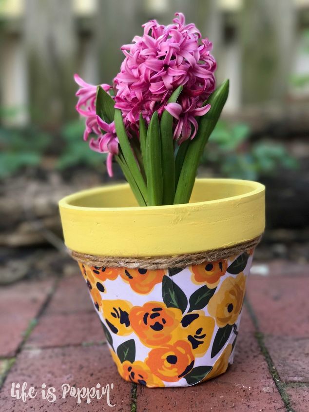 s 22 idea to make your terra cotta pots look oh so pretty, Decoupage it with decorative paper
