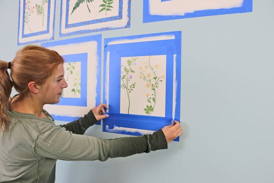 stenciling a faux gallery wall using botanical stencils