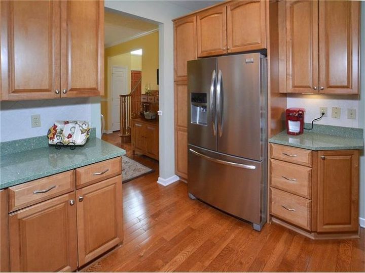 how do i learn to love the green quartz countertops in new house