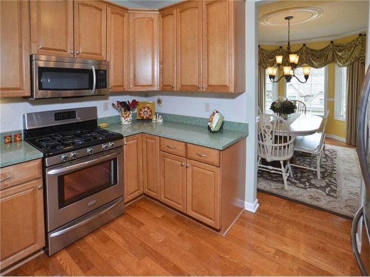 how do i learn to love the green quartz countertops in new house