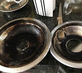 q how do i clean or remove black baked on stuff from the stove