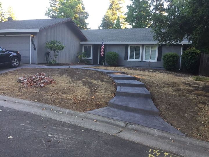 q how to landscape a steep front yard