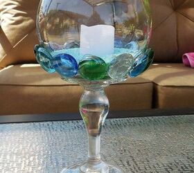 15 amazing things you can make with dollar store gems, Add them to a candleholder for some color