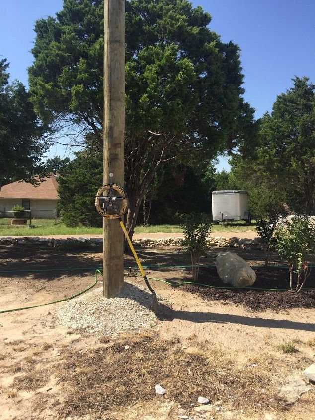 how can i make an electric pole go away in my landscaping