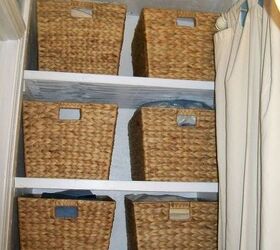 old heater closet turned into a linen and catch all closet