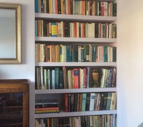 organizing books and tv with built in alcove shelving