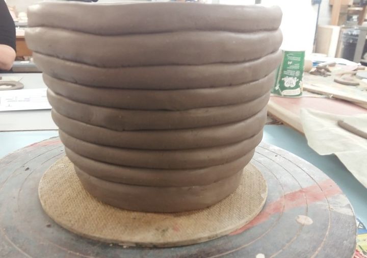 shiny black ceramic coil pot