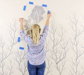 design an accent wall using botanical branch stencils