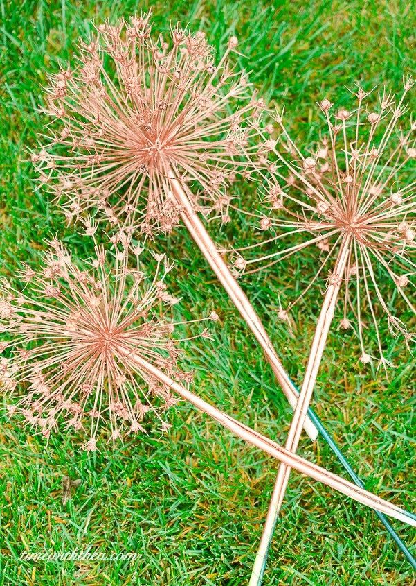 s 30 stunning ways to use metallic paint no experience necessary, Coat Allium Flowers In Copper For The Garden