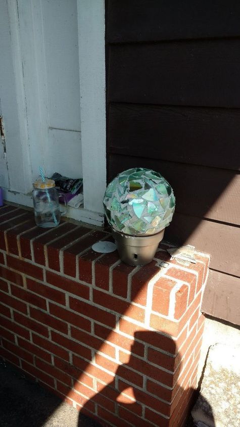 s 30 stunning ways to use metallic paint no experience necessary, Decorate Shining Gazing Balls For The Garden
