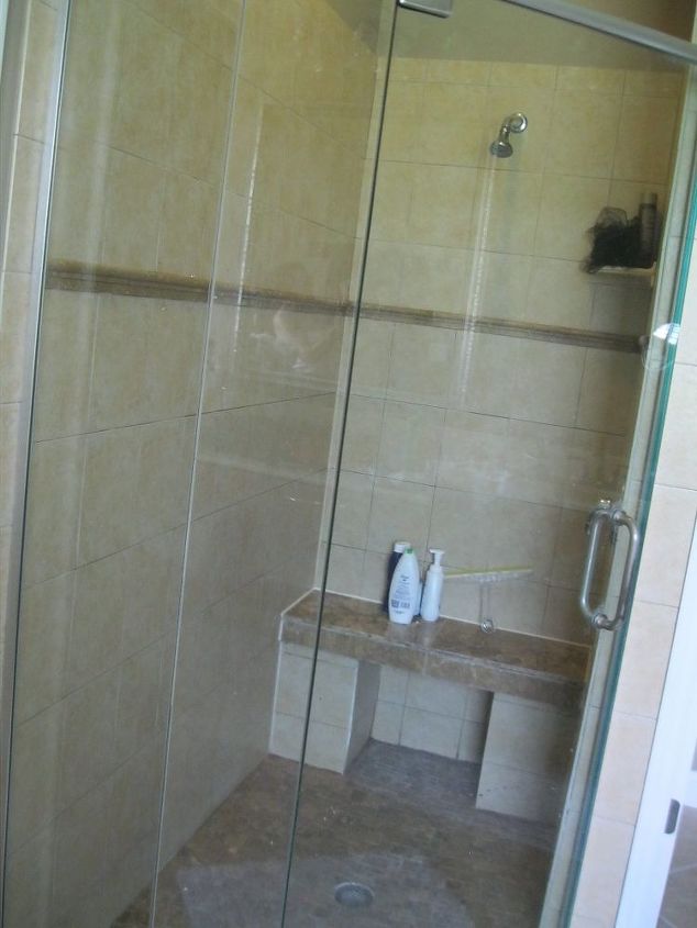 q whats more in for tile in the shower large tile or the sub way tile
