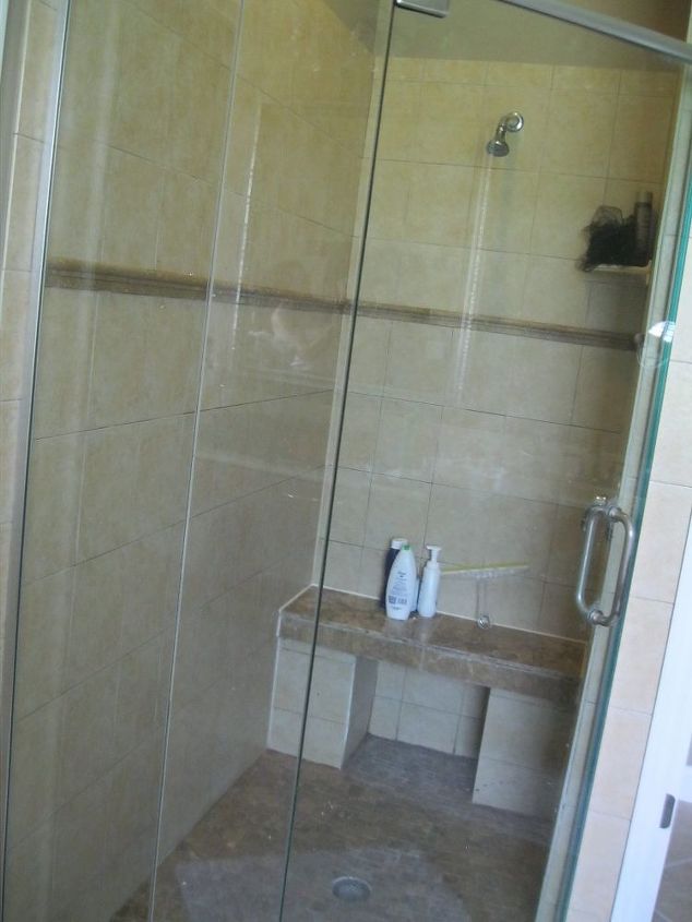 q whats more in for tile in the shower large tile or the sub way tile