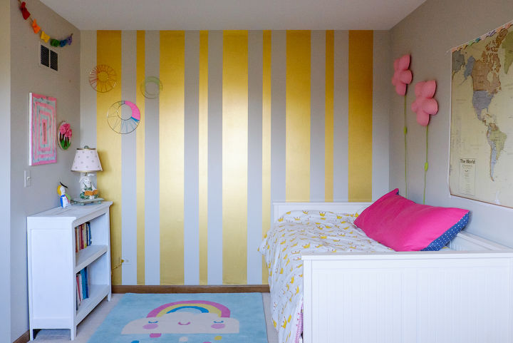 s 15 unbelievable ways people paint their walls, They stripe up a gold feature wall