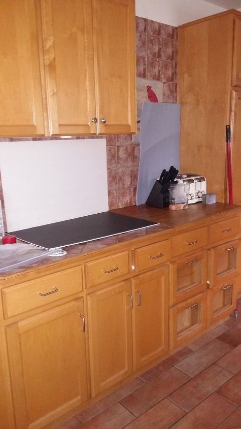 q what to do with my back splash and counters not doing my cupboards