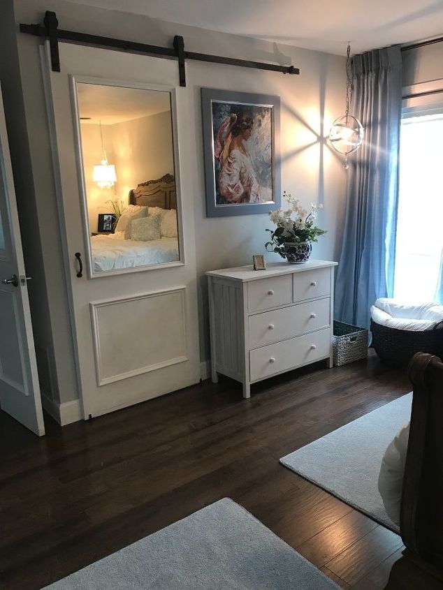 pretty sliding barn door it slides behind a dresser