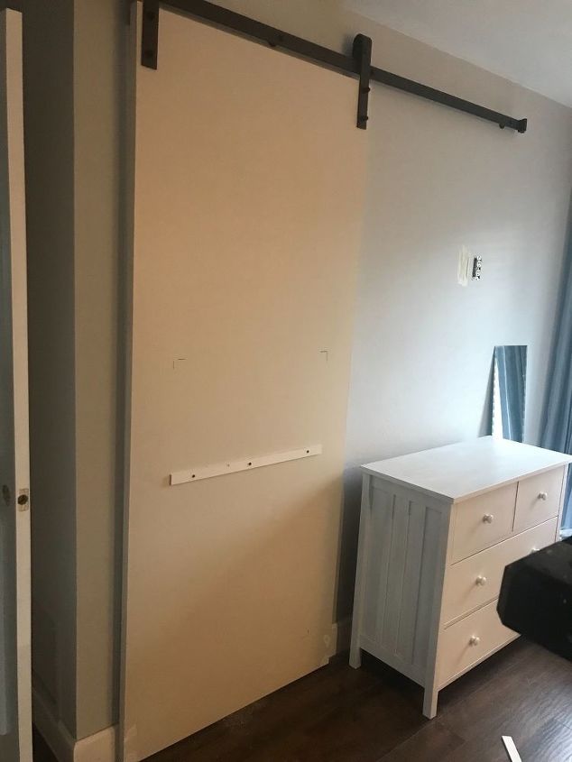 pretty sliding barn door it slides behind a dresser
