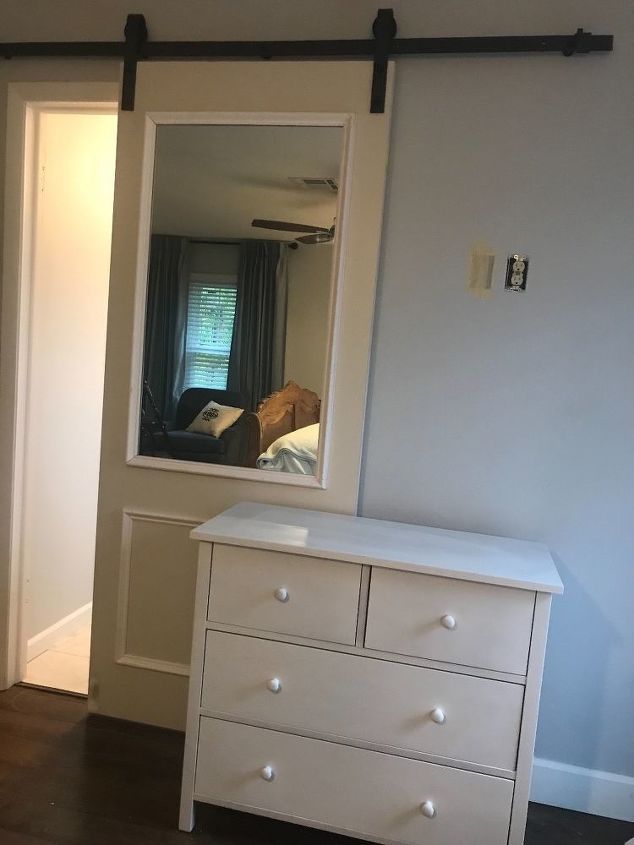 pretty sliding barn door it slides behind a dresser