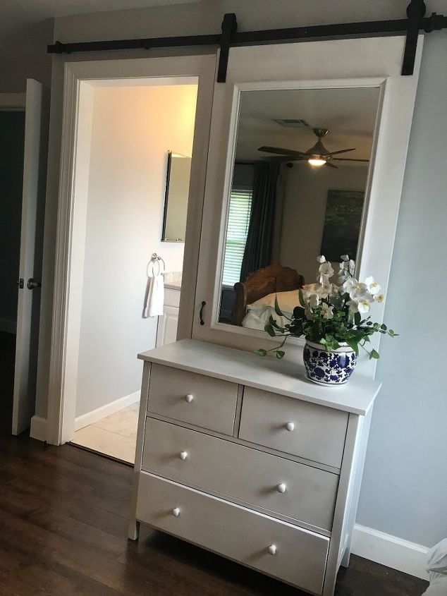 pretty sliding barn door it slides behind a dresser