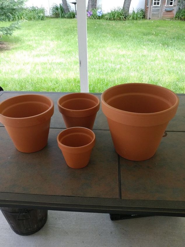 terra cotta pot lighthouse with solar light