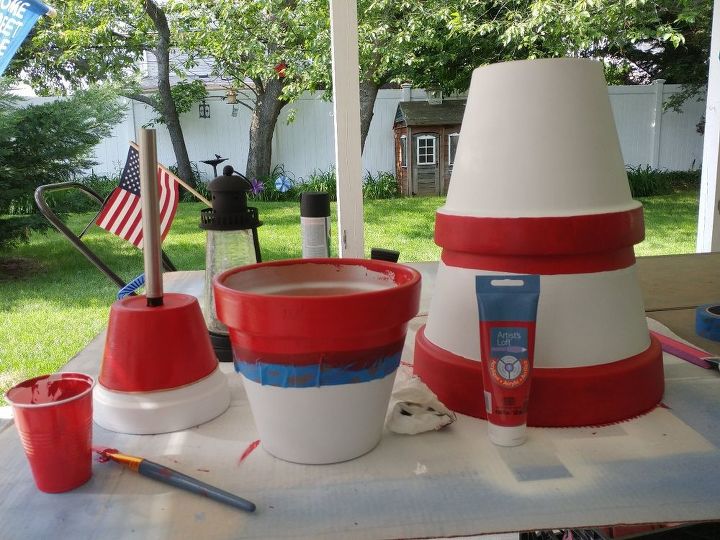 terra cotta pot lighthouse with solar light