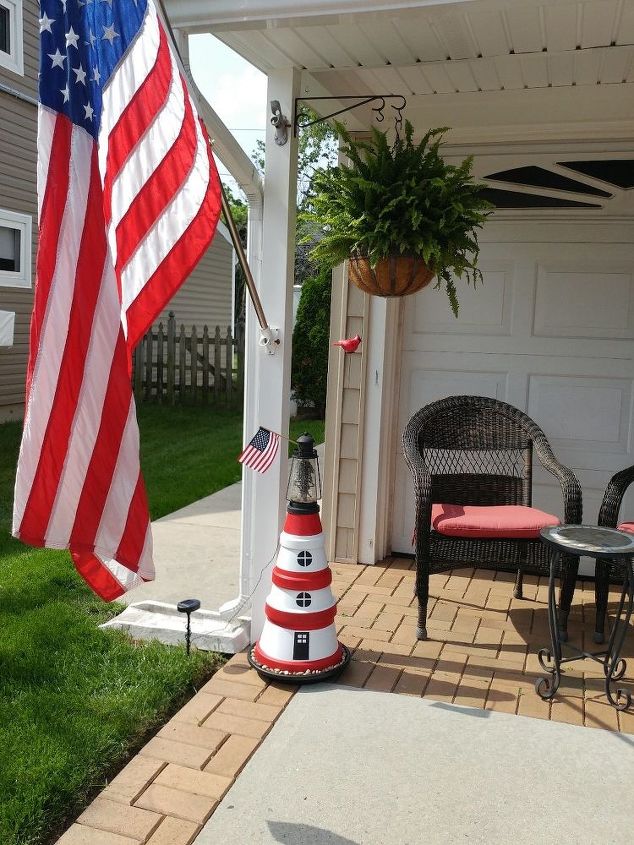 terra cotta pot lighthouse with solar light