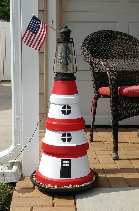 terra cotta pot lighthouse with solar light