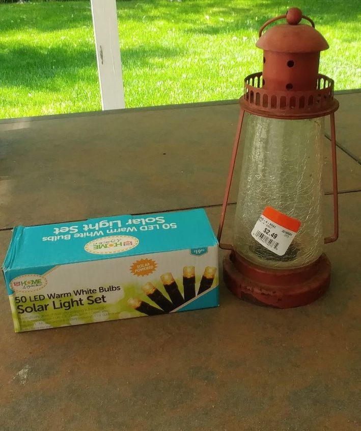 terra cotta pot lighthouse with solar light