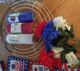 dollar store july 4th wreath makes your doorway inviting for dollars, All the dollar store supplies needed