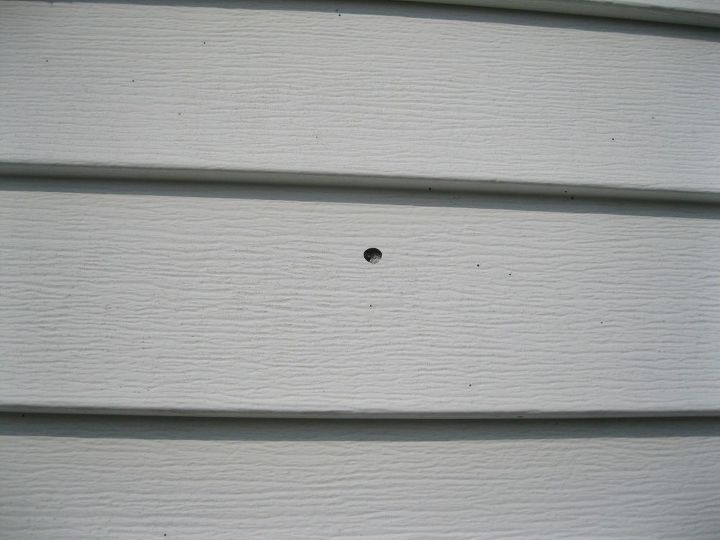 How does one repair, fix or patch vinyl siding?