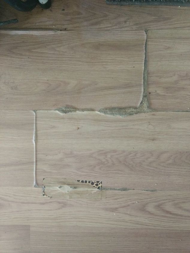 q how can i fix this floor laminate and was under a rug that got wet