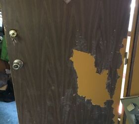 q how to remove stuck on paint from a very old mobile home door