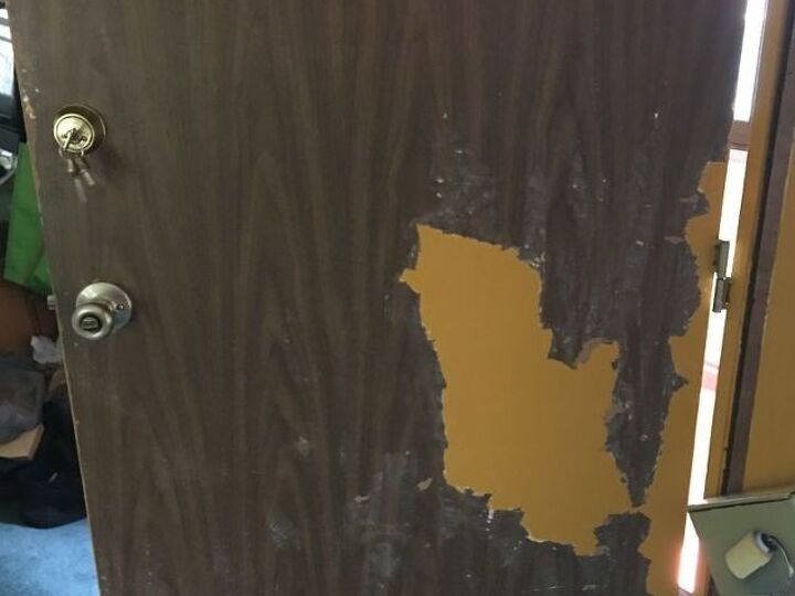 q how to remove stuck on paint from a very old mobile home door