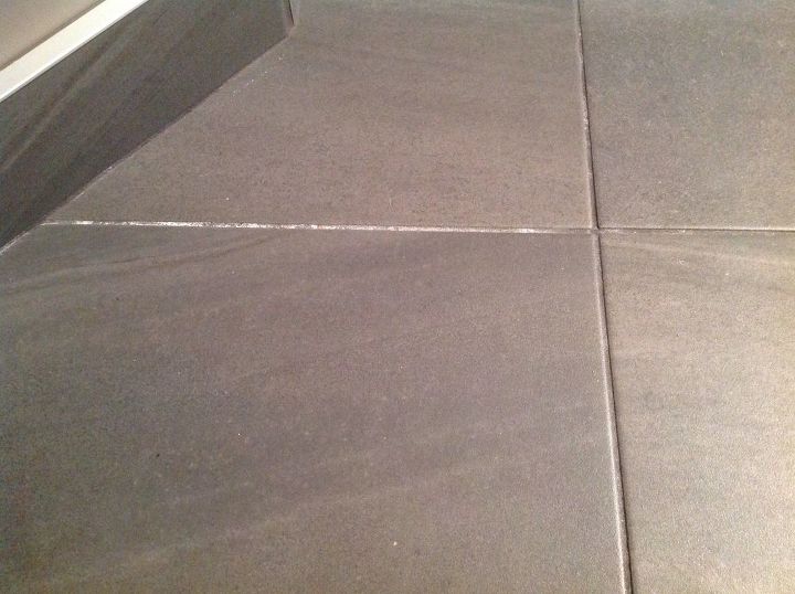 how to clean white mineral deposits off of dark grout