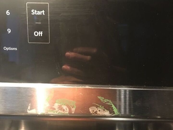q how do i get melted plastic off my stainless steel stove