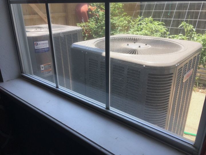 q air conditioner desguise from inside the house