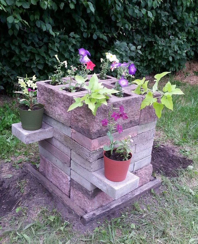 18 easy diy projects that you can do this weekend, Cinder Block Planter With Shelves